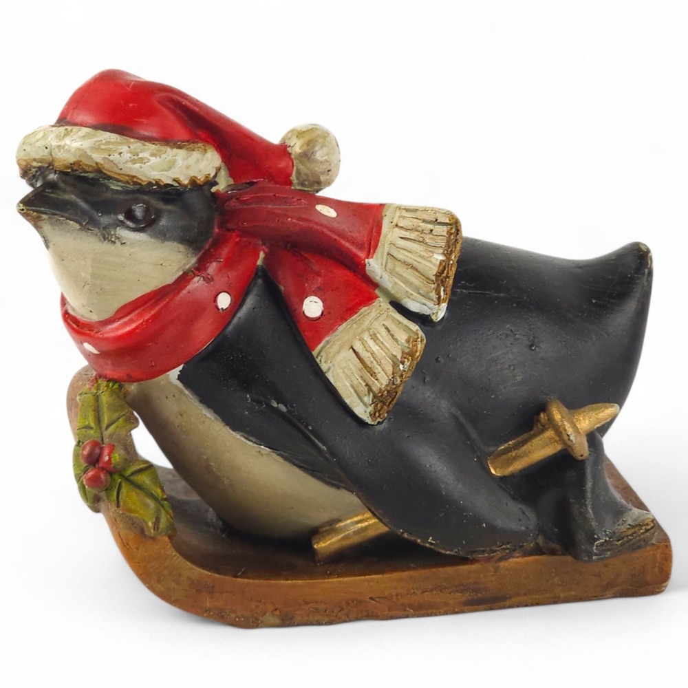 TII Collections Vintage Penguin Sledding Skiing Resin Figurine